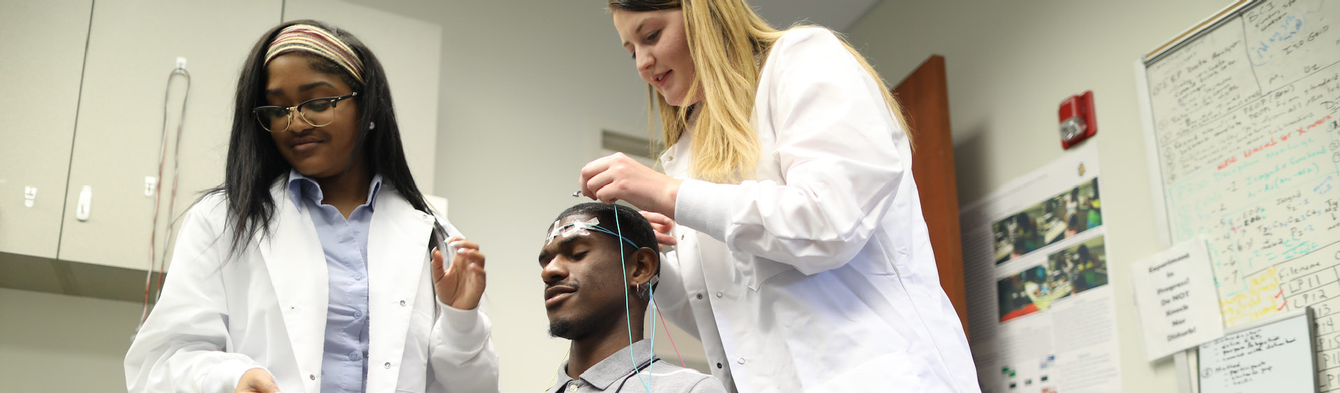 Students carrying out neural research